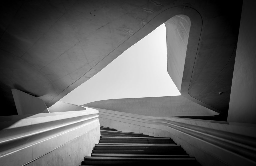 Modern architecture and empty staircase leading to a bright open space